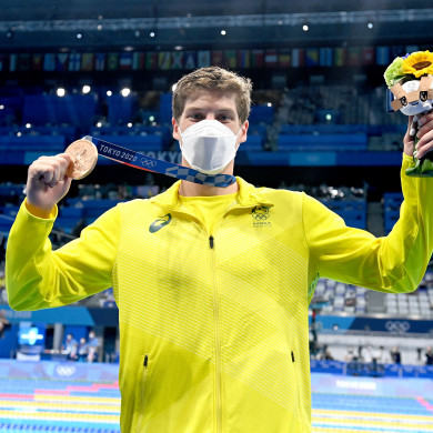 Smith proudly displays his bronze medal